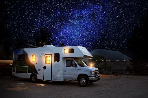 RV with night sky